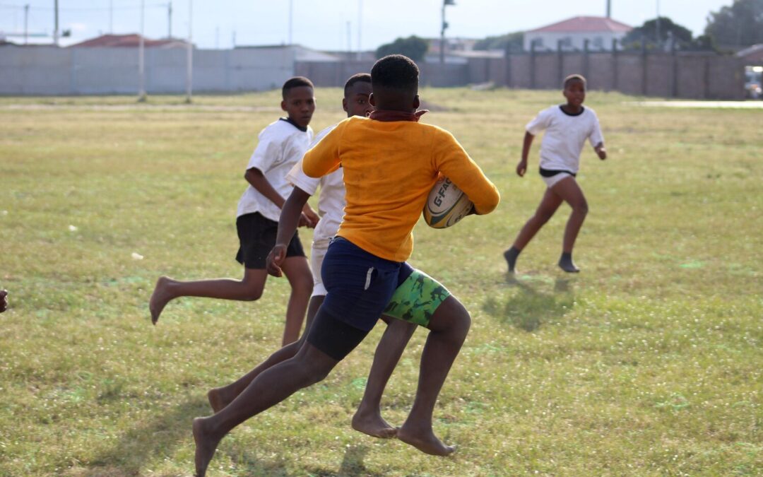 Teammates Supporting Each Other in Khayelitsha!